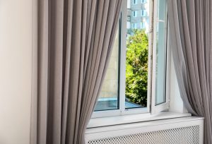 grey curtains with window 